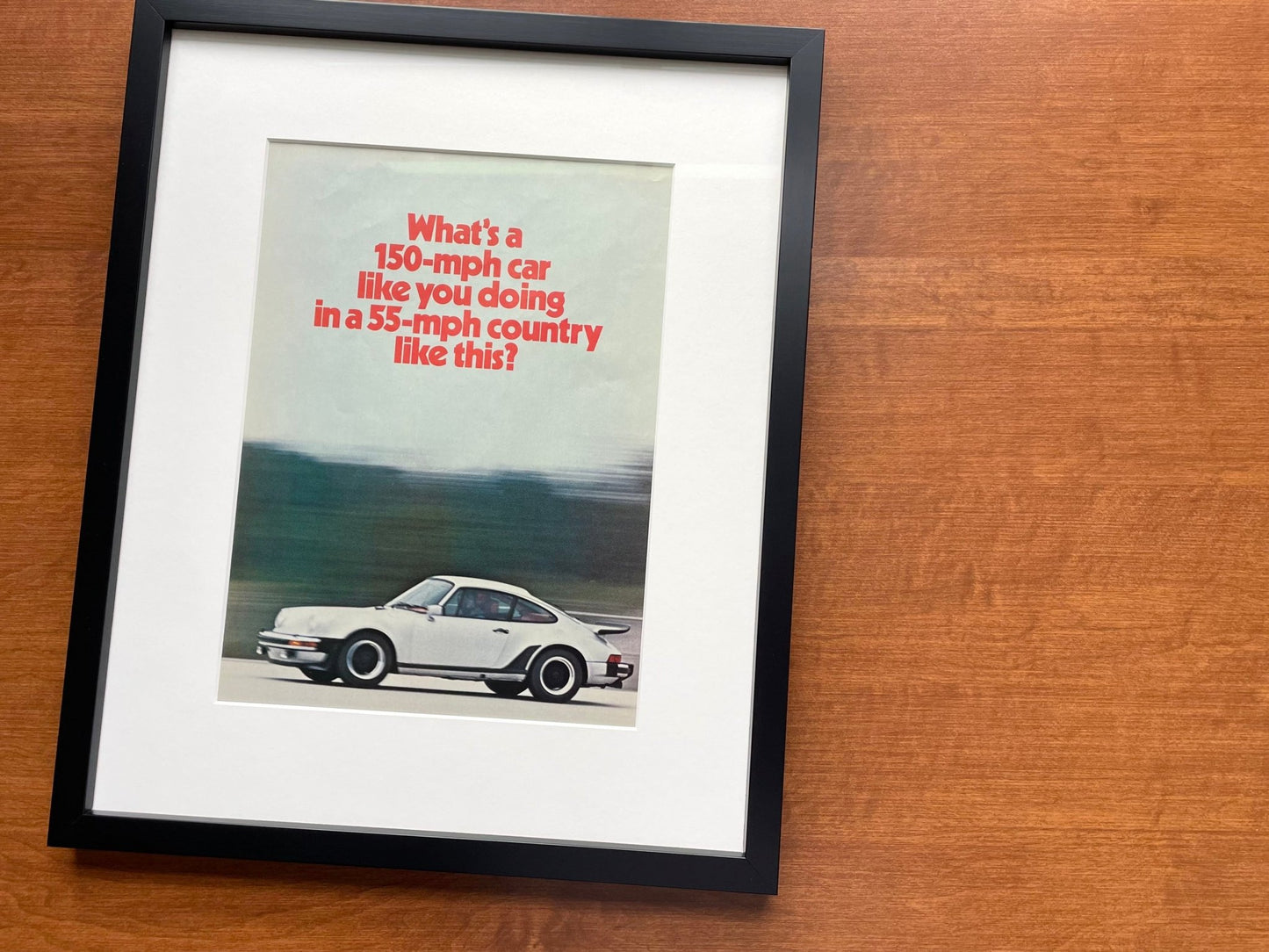 1975 Porsche "150 - mph car..." Original Magazine Page Image in Black Wood Frame