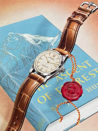 1957 Rolex Oyster Perpetual Ref 6564 feat. "Ascent of Everest" book Advertisement