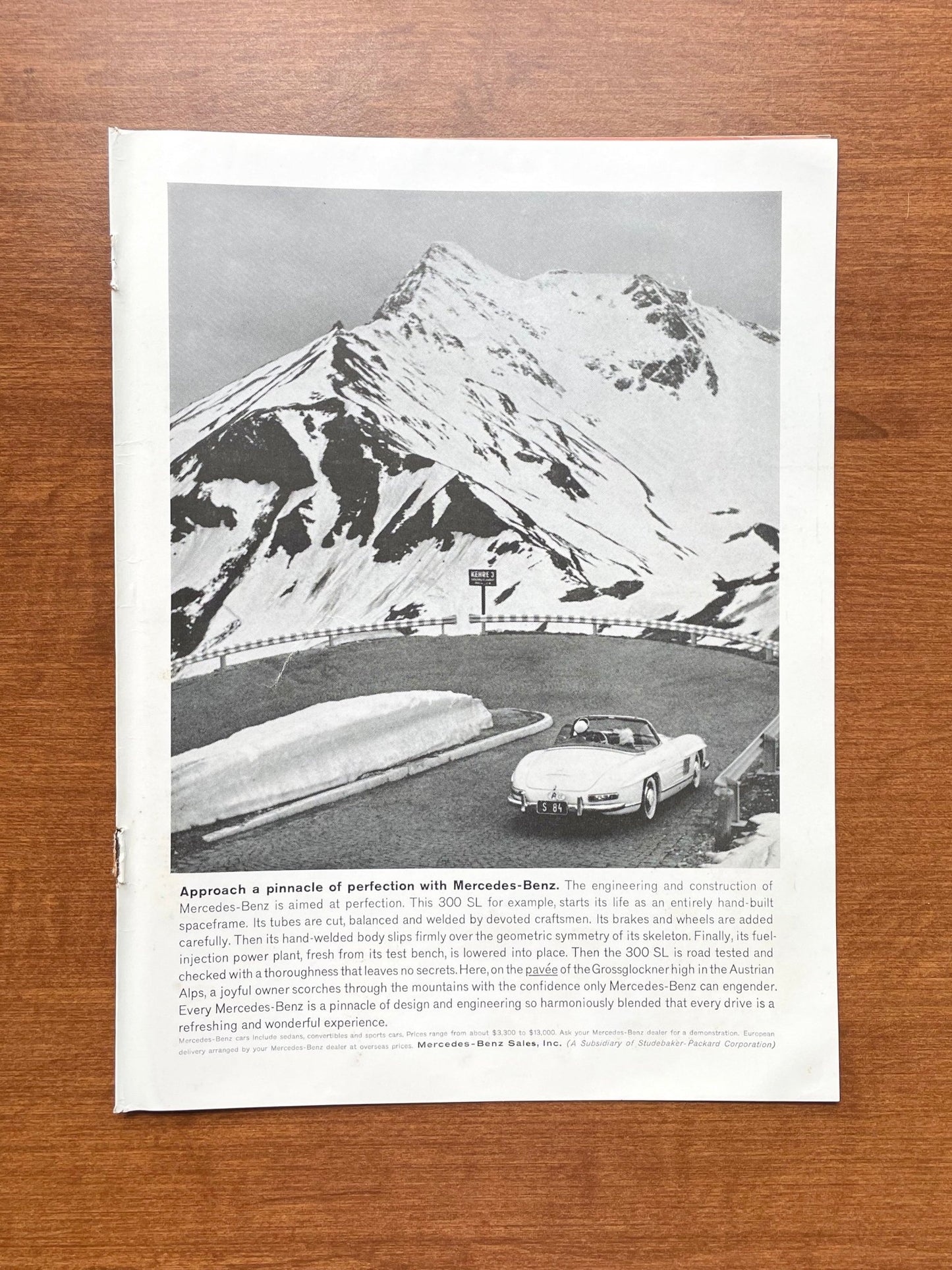 1961 Mercedes Benz 300 SL in Austrian Alps Advertisement