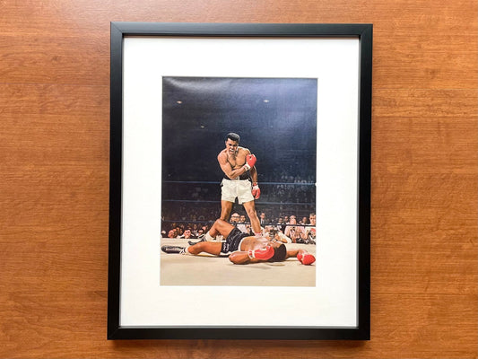 1965 Muhammad Ali "knocks out" Sonny Liston Original Magazine Page Image in Black Wood Frame