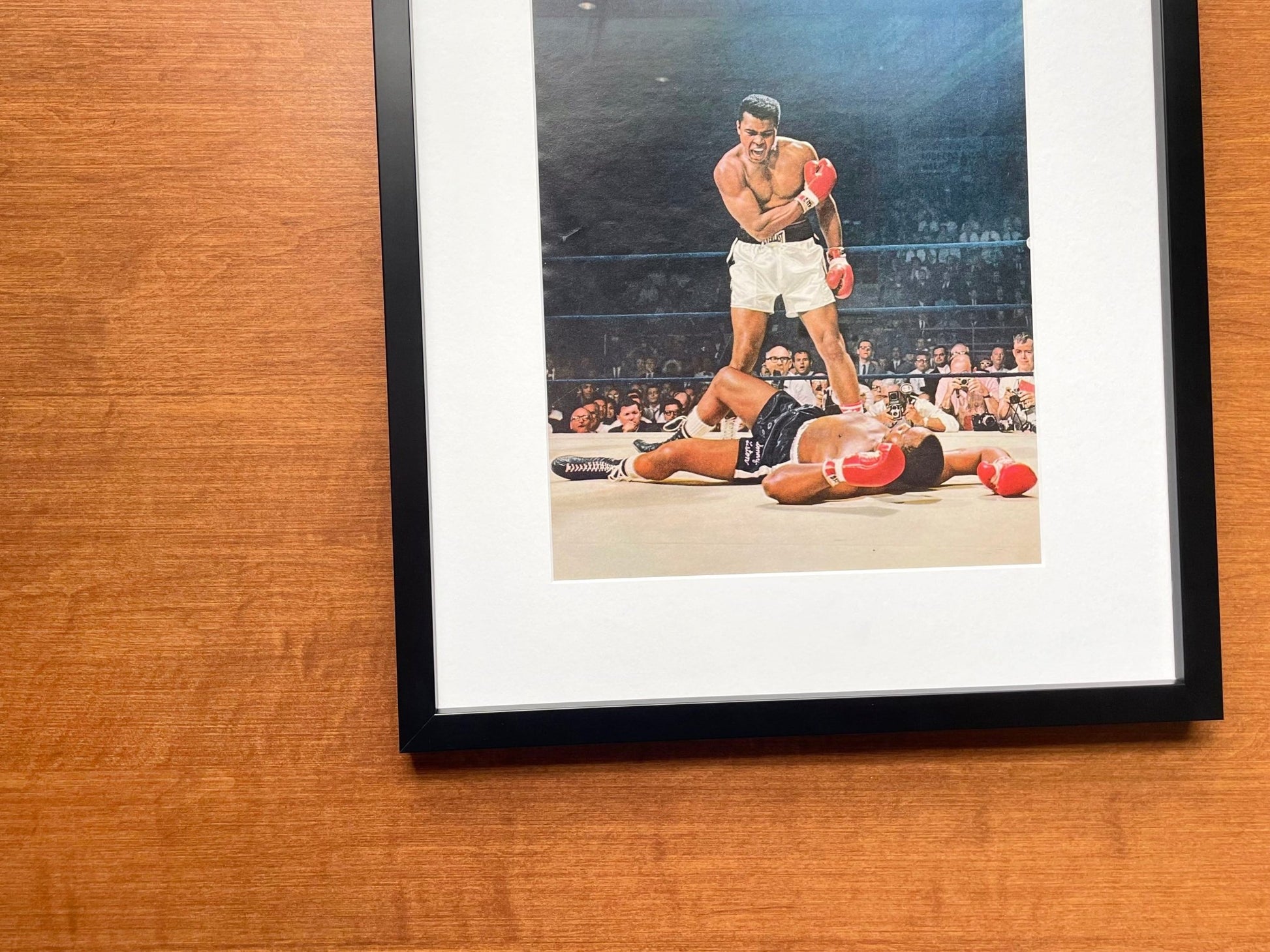 1965 Muhammad Ali "knocks out" Sonny Liston Original Magazine Page Image in Black Wood Frame