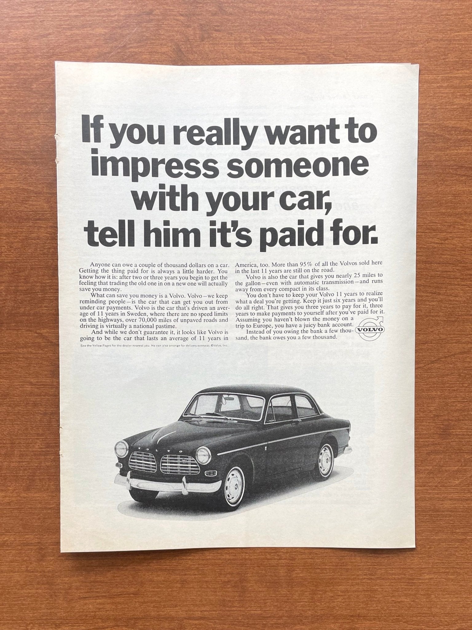 1967 Volvo "Impress someone... tell him it's paid for" Advertisement