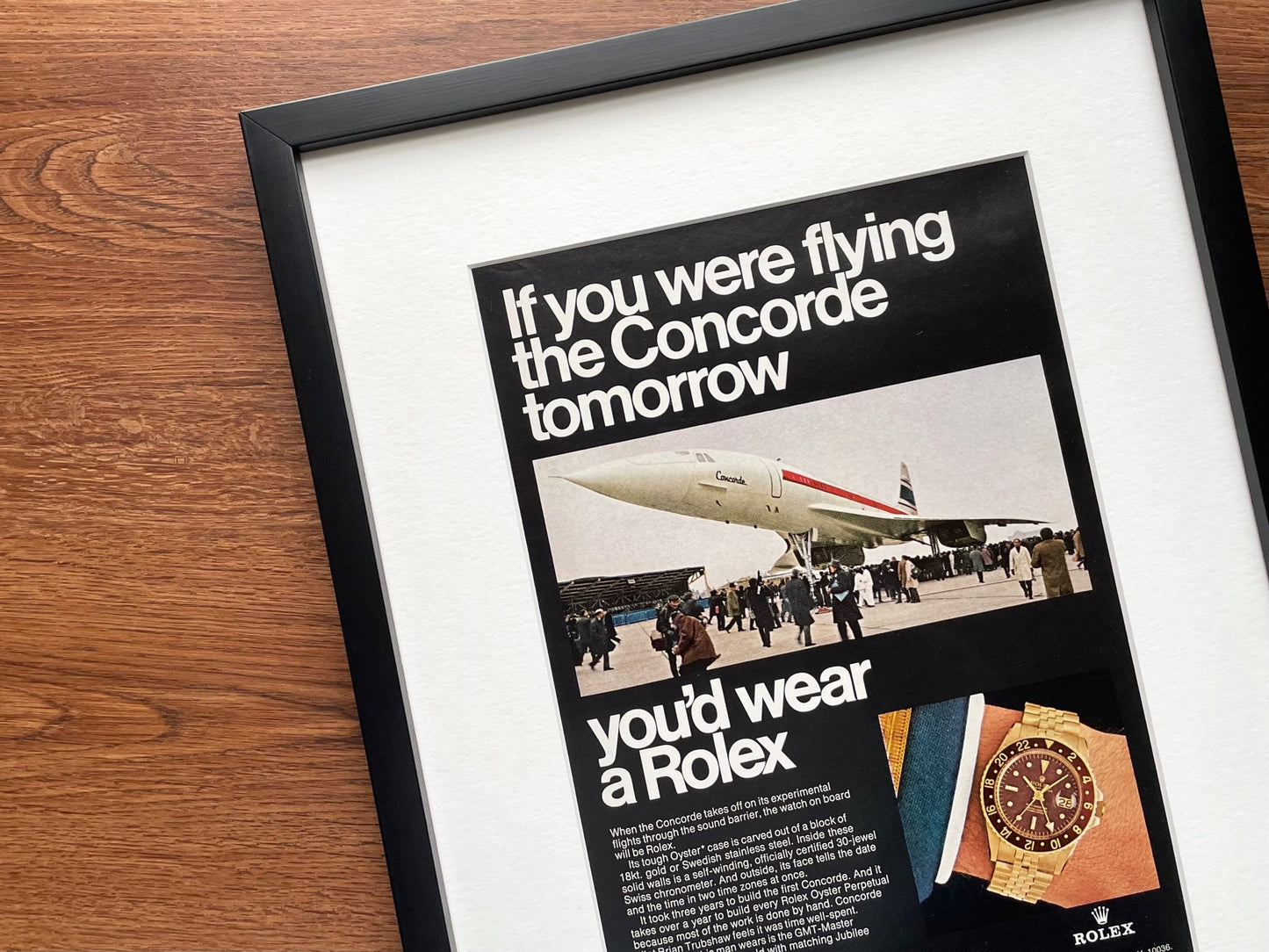 1968 Rolex GMT Master "If you were flying the Concorde" Advertisement in Black Wood Frame