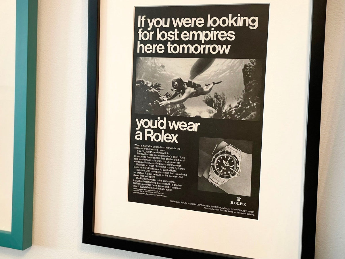 1968 Rolex Submariner "If you were looking for lost empires..." Advertisement in Black Wood Frame