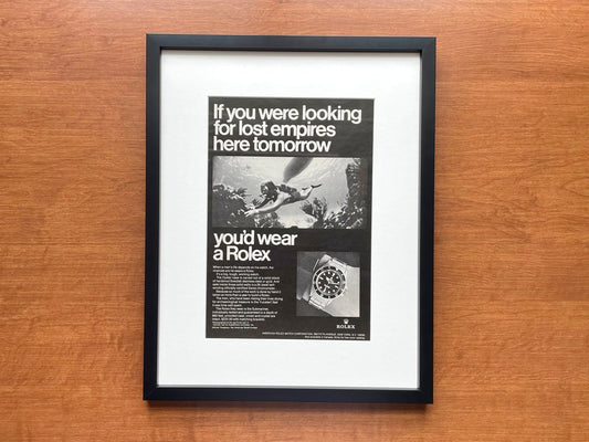 1968 Rolex Submariner "If you were looking for lost empires..." Advertisement in Black Wood Frame