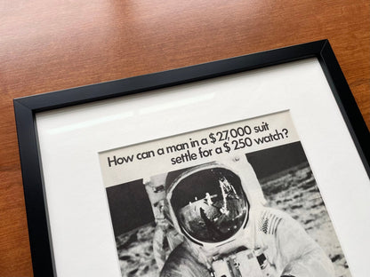 1975 Omega Speedmaster "man in a $27,000 suit..." Advertisement in Black Wood Frame