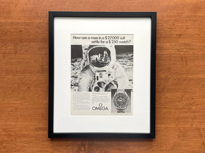 1975 Omega Speedmaster "man in a $27,000 suit..." Advertisement in Black Wood Frame