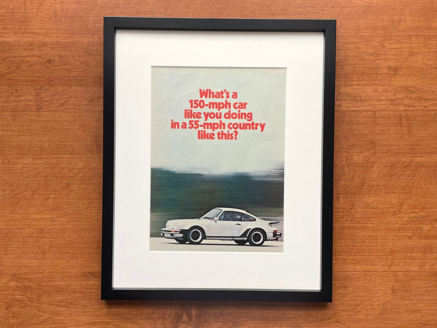 1975 Porsche "150 - mph car..." Original Magazine Page Image in Black Wood Frame