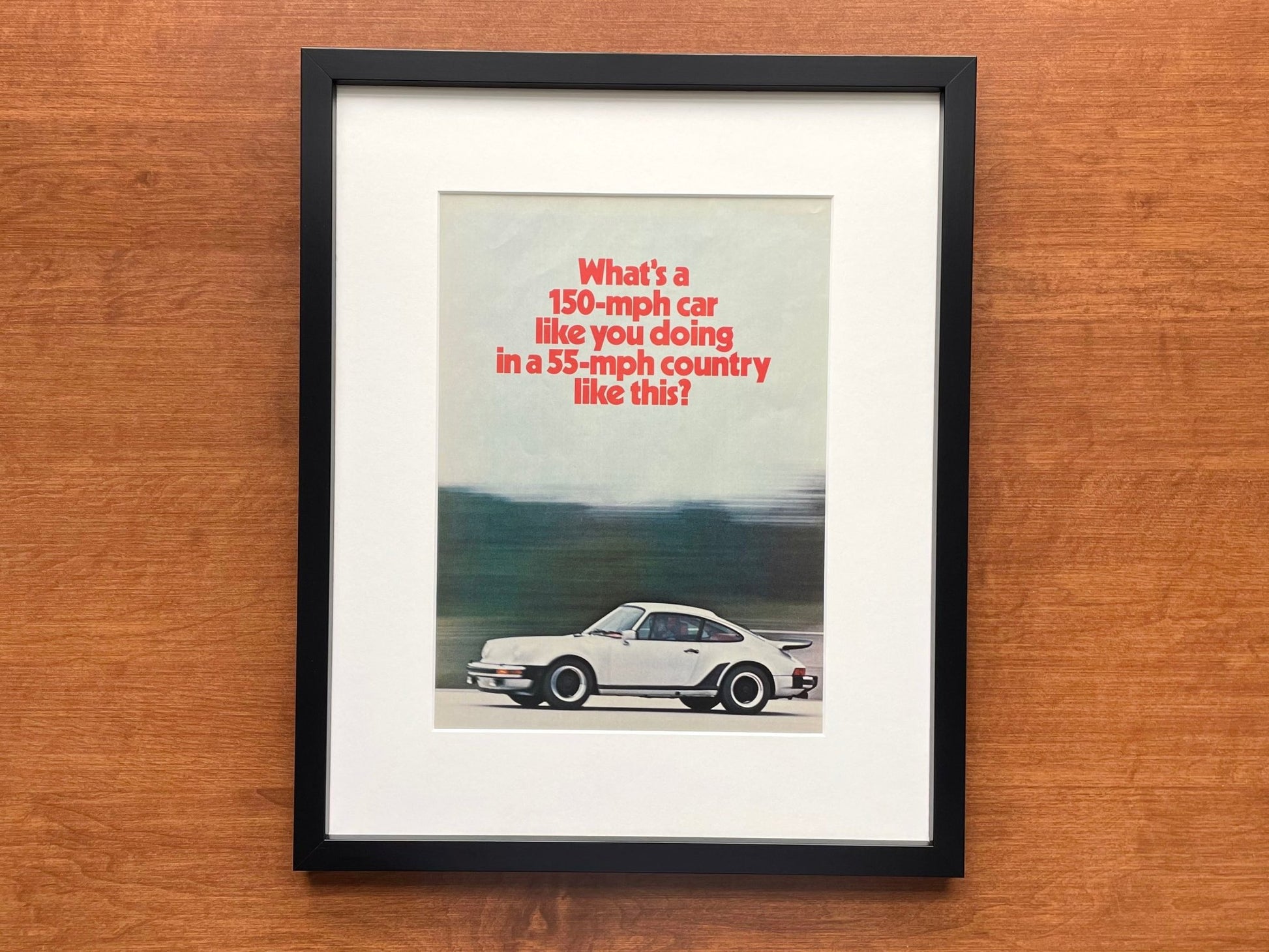 1975 Porsche "150 - mph car..." Original Magazine Page Image in Black Wood Frame