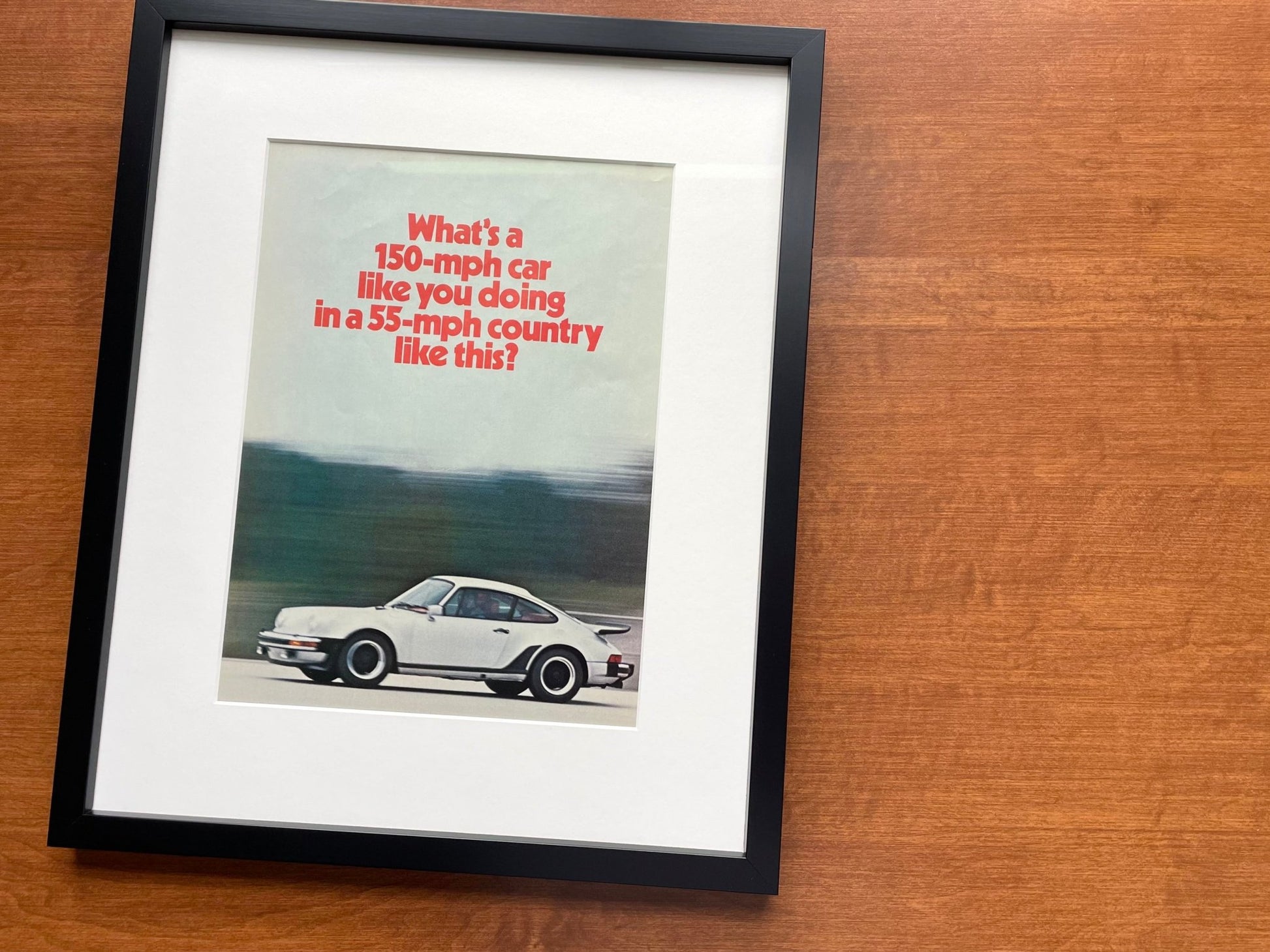 1975 Porsche "150 - mph car..." Original Magazine Page Image in Black Wood Frame