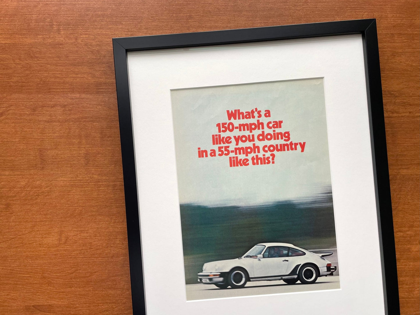 1975 Porsche "150 - mph car..." Original Magazine Page Image in Black Wood Frame