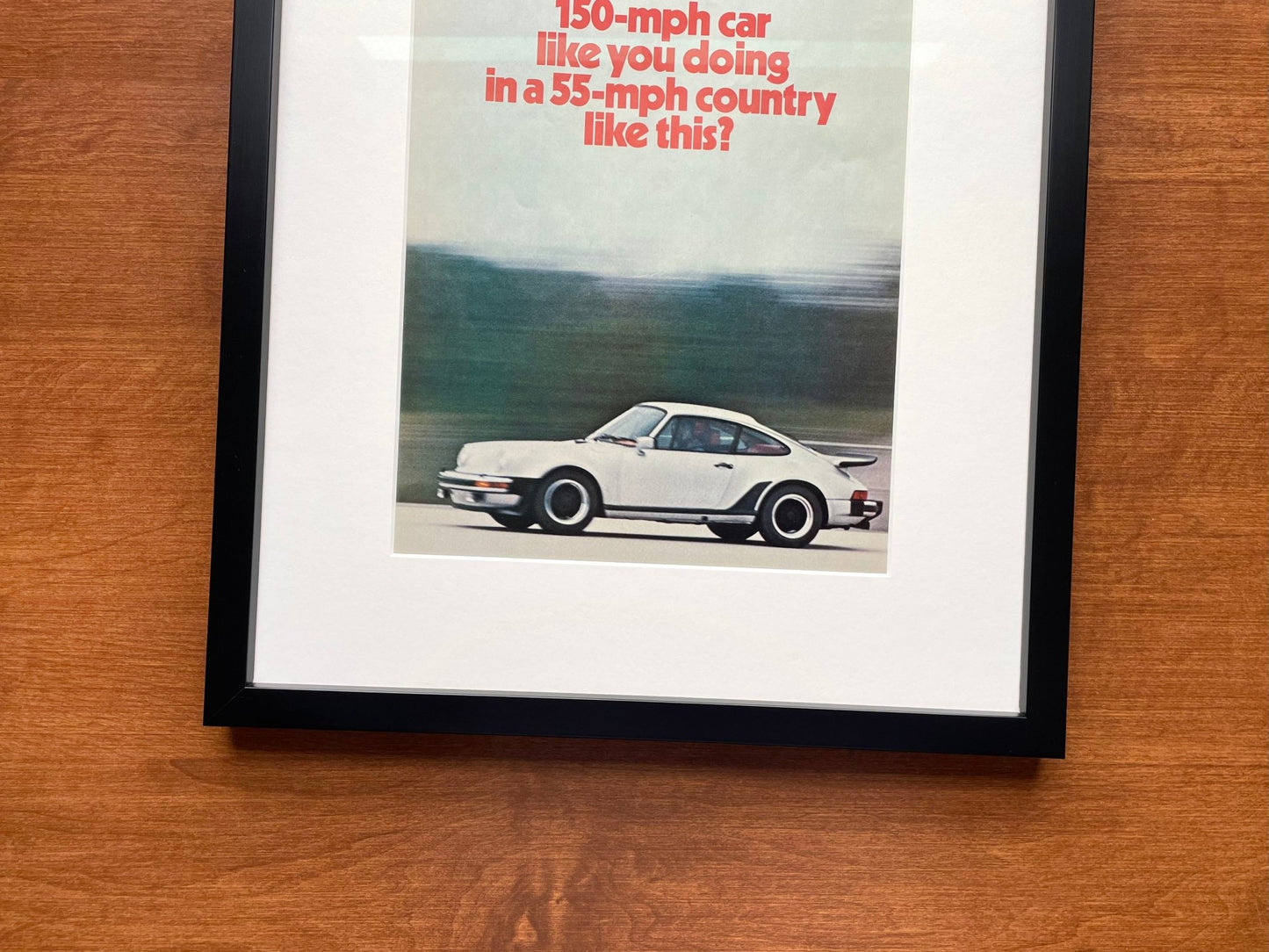 1975 Porsche "150 - mph car..." Original Magazine Page Image in Black Wood Frame