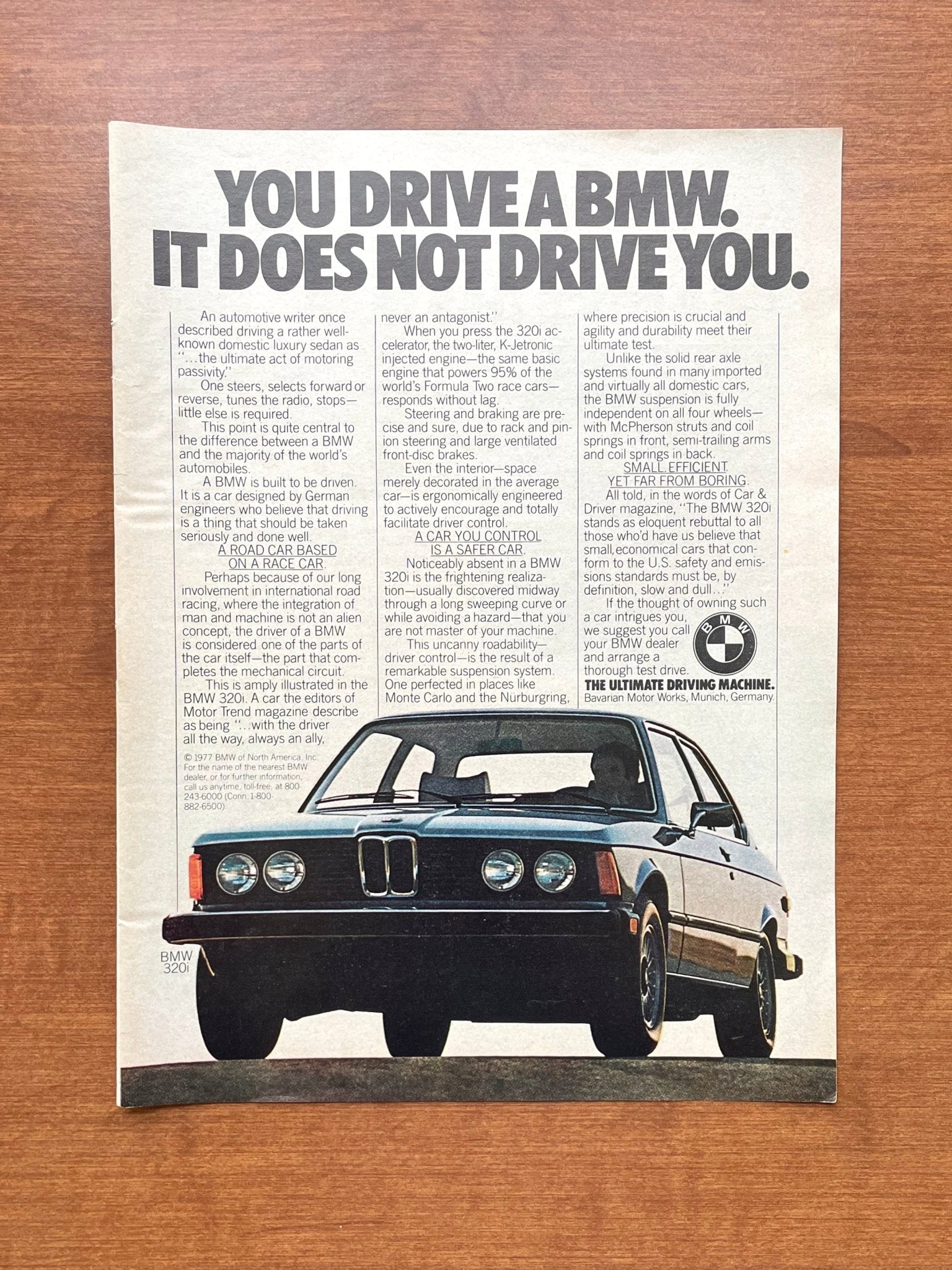 1977 BMW 320i "It does not drive you." Advertisement