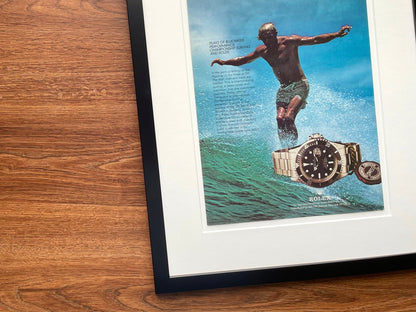 1978 Rolex Submariner with Surfer Advertisement in Black Wood Frame