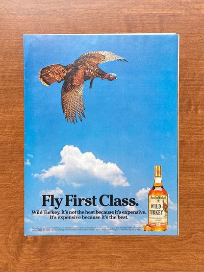 1980s Wild Turkey Bourbon Whiskey "Fly First Class" Advertisement