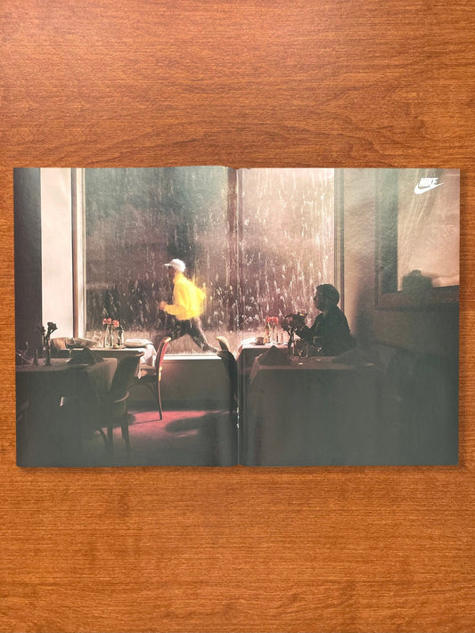 1993 Nike "running past restaurant in rain" Advertisement