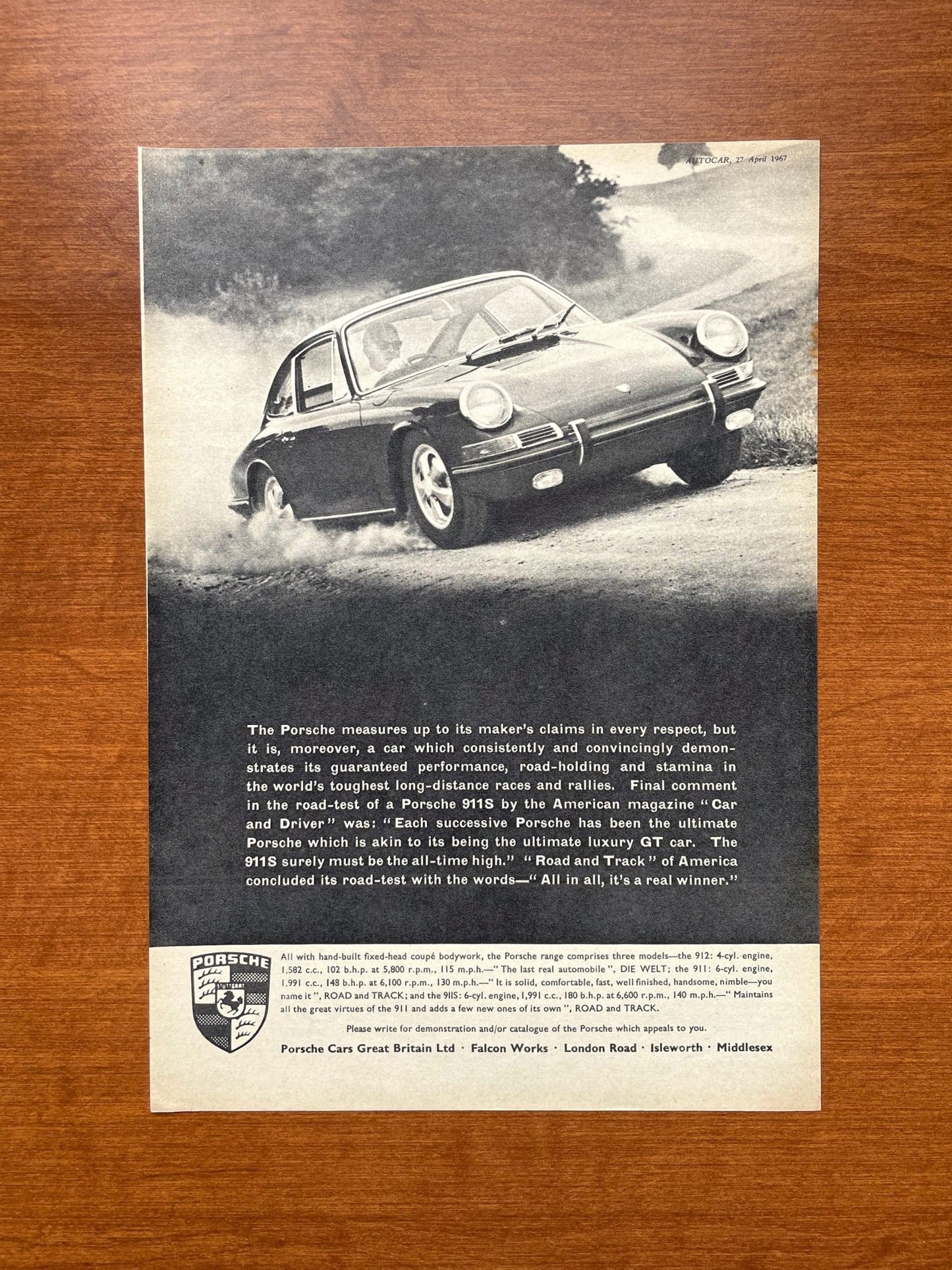 1967 Porsche 911S "measures up to its maker's claims..." Advertisement