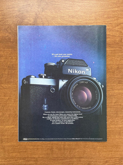 1973 Nikon "It's not just our name..." in color Advertisement