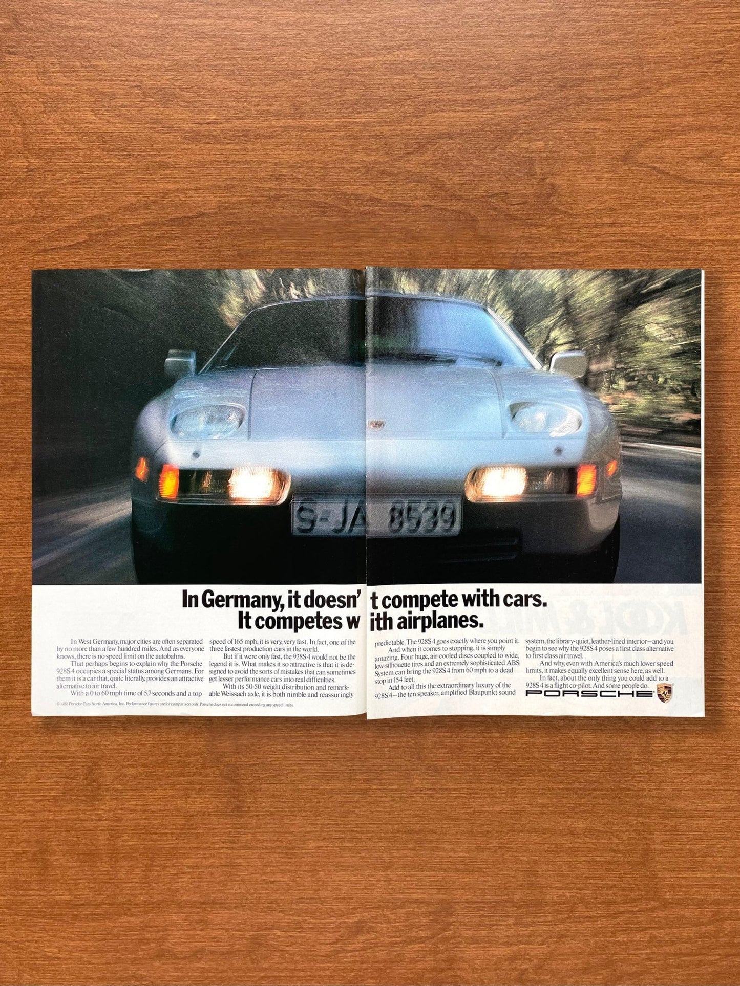 1989 Porsche 928S 4 "competes with airplanes." Advertisement