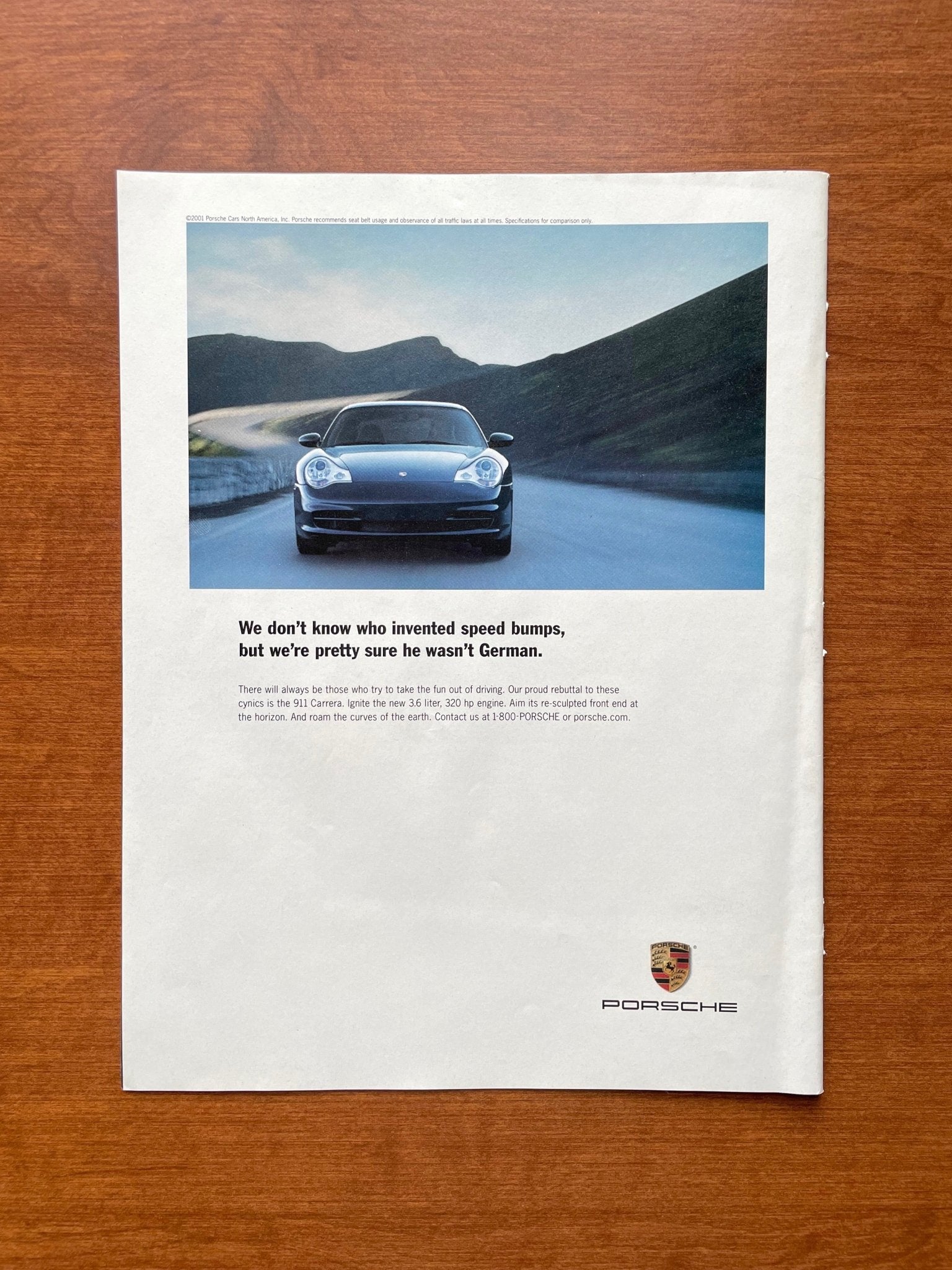 2002 Porsche 911 Carrera "speed bumps... wasn't German." Advertisement