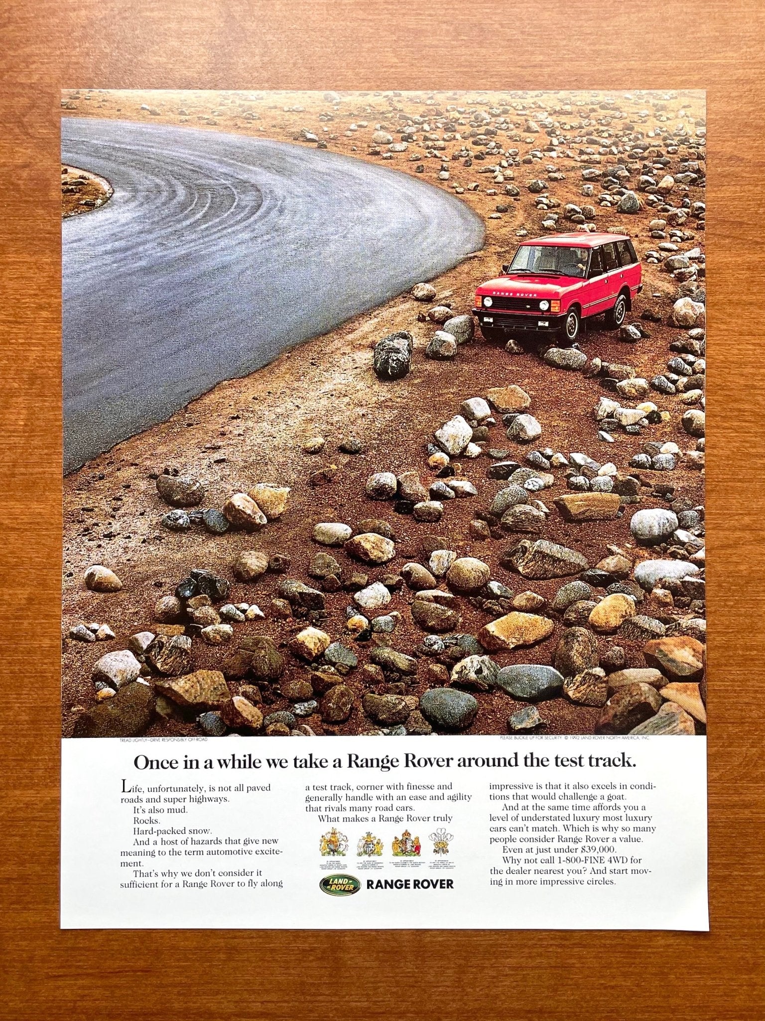Range Rover "around the test track." Ad Proof